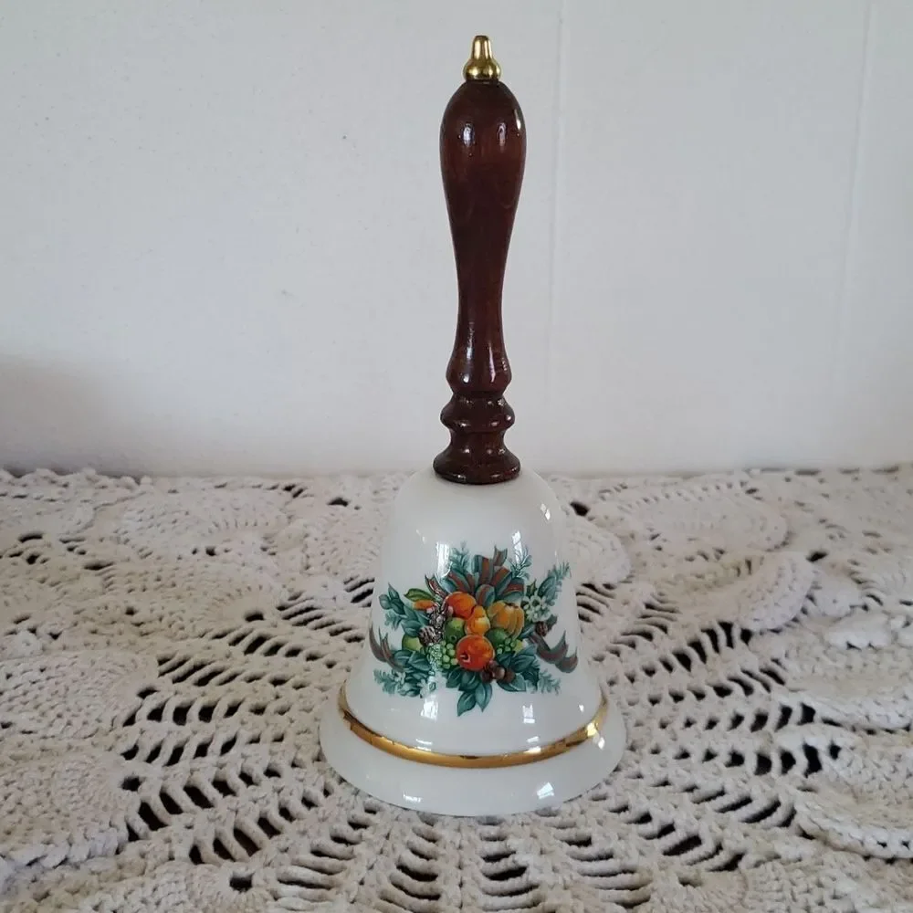 Vintage 1985 Avon Collectible Porcelain Christmas Bell with Wood Handle